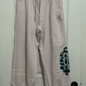 Free People Baby Light Pink Sweatpants with Green Design